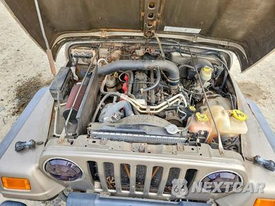 Zdjęcie 12 z 13 samochodu: 2003 JEEP WRANGLER COMMANDO VIN:1J4FA39S83P307533 - miniatura