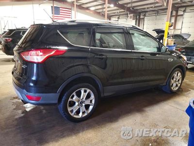 Trzecie zdjęcie samochodu z tyłu: 2016 FORD ESCAPE TITANIUM VIN:1FMCU9J97GUB85844 - miniatura