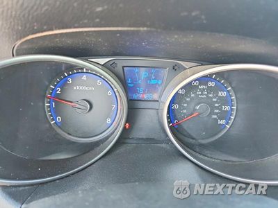 Zdjęcie 9 z 12 samochodu: 2012 HYUNDAI TUCSON LIMITED VIN:KM8JUCAC9CU382721 - miniatura