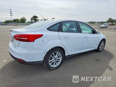 Trzecie zdjęcie samochodu z tyłu: 2016 FORD FOCUS SE VIN:1FADP3F20GL215142 - miniatura