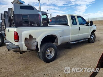 Trzecie zdjęcie samochodu z tyłu: 1999 FORD F350 SUPER DUTY VIN:1FTWX33F9XEA62386 - miniatura