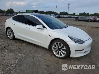 Czwarte zdjęcie samochodu z boku: 2019 TESLA MODEL 3 VIN:5YJ3E1EBXKF512495 - miniatura