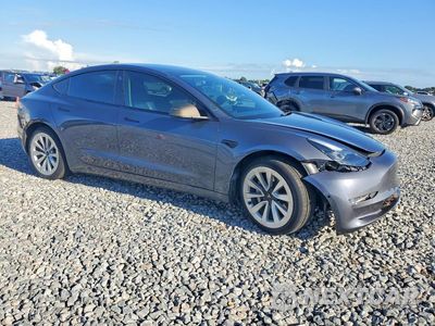 Czwarte zdjęcie samochodu z boku: 2022 TESLA MODEL 3 VIN:5YJ3E1EB6NF191074 - miniatura