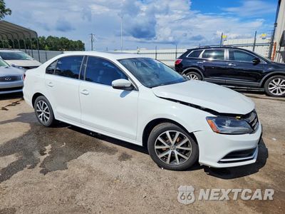 Czwarte zdjęcie samochodu z boku: 2017 VOLKSWAGEN JETTA SE VIN:3VWDB7AJ2HM394019 - miniatura