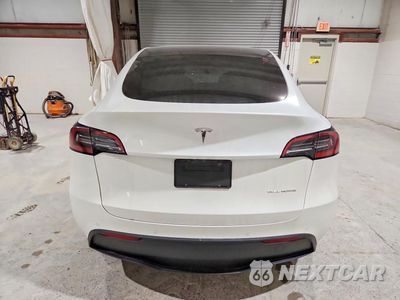 Zdjęcie 6 z 12 samochodu: 2022 TESLA MODEL Y VIN:7SAYGAEE1NF518882 - miniatura