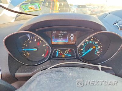 Zdjęcie 9 z 12 samochodu: 2013 FORD ESCAPE TITANIUM VIN:1FMCU9J97DUD63361 - miniatura