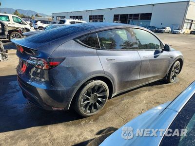 Trzecie zdjęcie samochodu z tyłu: 2023 TESLA MODEL Y VIN:7SAYGAEE9PF713860 - miniatura