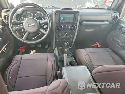 Zdjęcie 8 z 13 samochodu: 2007 JEEP WRANGLER SAHARA VIN:1J4GB59197L220354 - miniatura