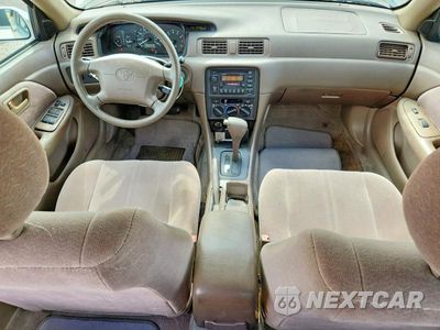 Zdjęcie 8 z 12 samochodu: 1999 TOYOTA CAMRY LE VIN:JT2BG28K4X0366651 - miniatura