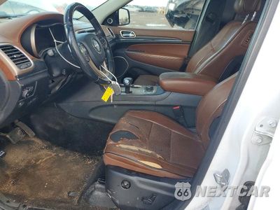Zdjęcie 7 z 13 samochodu: 2015 JEEP GRAND CHEROKEE SUMMIT VIN:1C4RJFJG6FC956464 - miniatura