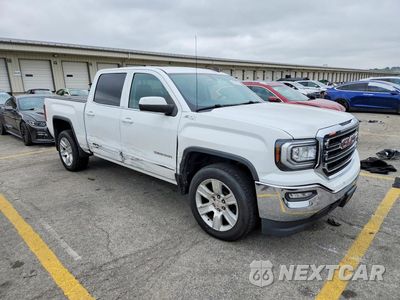 Czwarte zdjęcie samochodu z boku: 2017 GMC SIERRA K1500 SLE VIN:3GTU2MEC2HG468986 - miniatura