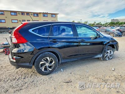 Trzecie zdjęcie samochodu z tyłu: 2016 HONDA CR-V LX VIN:2HKRM3H38GH557201 - miniatura