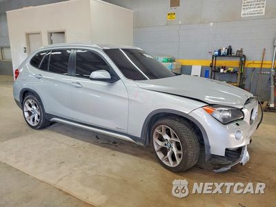 Czwarte zdjęcie samochodu z boku: 2013 BMW X1 XDRIVE28I VIN:WBAVL1C56DVR86571 - miniatura