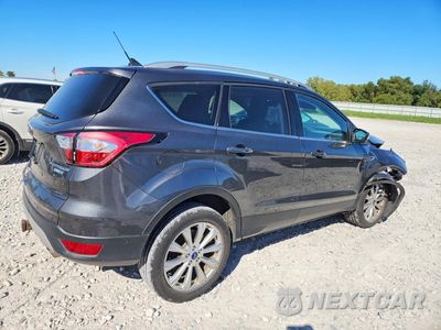 Trzecie zdjęcie samochodu z tyłu: 2018 FORD ESCAPE TITANIUM VIN:1FMCU9J90JUC33644 - miniatura