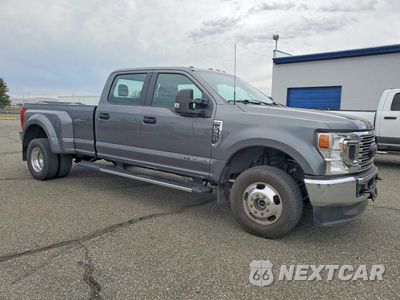 Czwarte zdjęcie samochodu z boku: 2022 FORD F350 SUPER DUTY VIN:1FT8W3DT5NEG13944 - miniatura