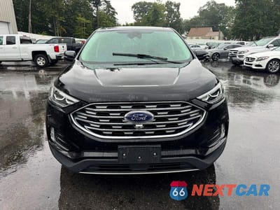 Piąte zdjęcie samochodu w środku: 2020 FORD EDGE TITANIUM VIN:2FMPK4K99LBB35682 - miniatura