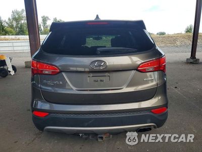 Zdjęcie 6 z 12 samochodu: 2013 HYUNDAI SANTA FE SPORT 2.4L VIN:5XYZT3LB9DG036962 - miniatura