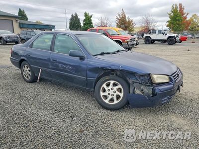 Czwarte zdjęcie samochodu z boku: 1999 TOYOTA CAMRY LE VIN:4T1BG22K1XU902637 - miniatura