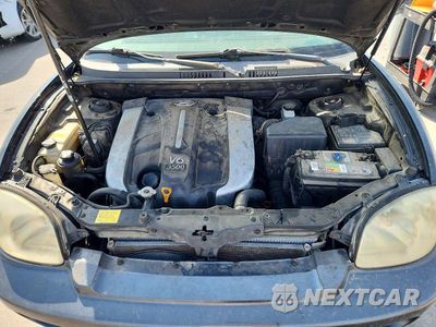 Zdjęcie 12 z 13 samochodu: 2004 HYUNDAI SANTA FE GLS VIN:KM8SC13E84U652114 - miniatura