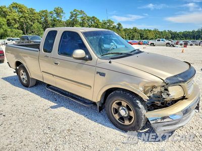 Czwarte zdjęcie samochodu z boku: 1999 FORD F150 VIN:1FTRX17W8XKB62749 - miniatura
