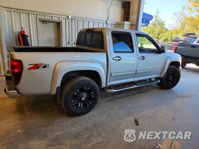 Trzecie zdjęcie samochodu z tyłu: 2012 CHEVROLET COLORADO LT VIN:1GCHTDFE1C8117662 - miniatura