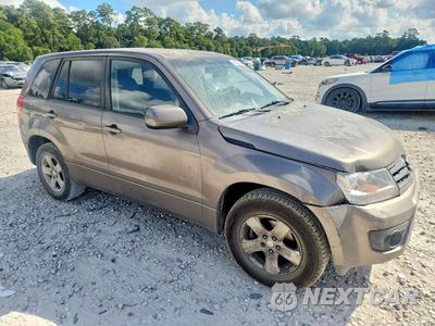 Czwarte zdjęcie samochodu z boku: 2013 SUZUKI GRAND VITARA PREMIUM VIN:JS3TE0D69D4100255 - miniatura