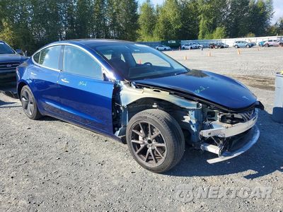 Czwarte zdjęcie samochodu z boku: 2018 TESLA MODEL 3 VIN:5YJ3E1EA9JF059055 - miniatura