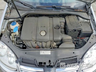 Zdjęcie 11 z 12 samochodu: 2010 VOLKSWAGEN JETTA SE VIN:3VWRZ7AJ4AM098460 - miniatura