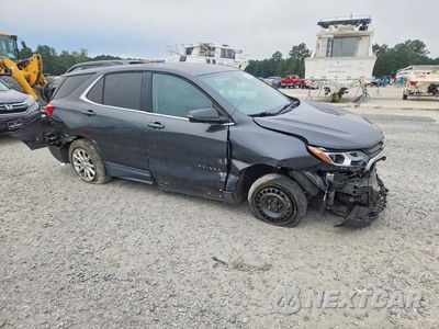 Czwarte zdjęcie samochodu z boku: 2018 CHEVROLET EQUINOX LT VIN:2GNAXJEV2J6140075 - miniatura