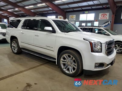Czwarte zdjęcie samochodu z boku: 2017 GMC YUKON XL K1500 SLT VIN:1GKS2GKC2HR207536 - miniatura