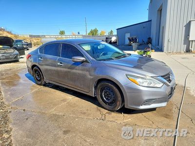 Czwarte zdjęcie samochodu z boku: 2016 NISSAN ALTIMA 2.5 S VIN:1N4AL3AP5GC178087 - miniatura