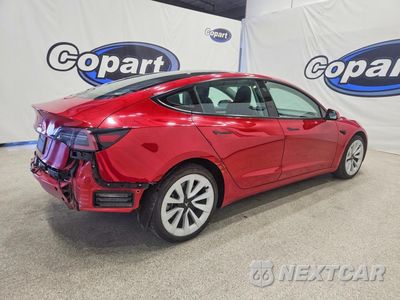 Trzecie zdjęcie samochodu z tyłu: 2023 TESLA MODEL 3 VIN:5YJ3E1EA3PF460268 - miniatura