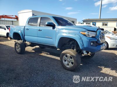 Czwarte zdjęcie samochodu z boku: 2019 TOYOTA TACOMA SR V6 VIN:3TMCZ5AN7KM202313 - miniatura