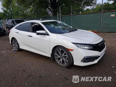 Czwarte zdjęcie samochodu z boku: 2019 HONDA CIVIC TOURING VIN:19XFC1F92KE201986 - miniatura