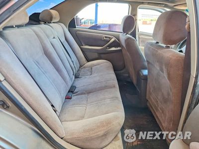 Zdjęcie 10 z 13 samochodu: 1999 TOYOTA CAMRY LE VIN:JT2BG28KXX0283841 - miniatura