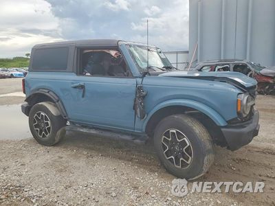 Czwarte zdjęcie samochodu z boku: 2022 FORD BRONCO BASE VIN:1FMDE5AP2NLB62256 - miniatura