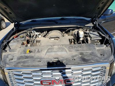Zdjęcie 11 z 12 samochodu: 2019 GMC YUKON XL DENALI VIN:1GKS2HKJ8KR252931 - miniatura