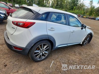 Trzecie zdjęcie samochodu z tyłu: 2016 MAZDA CX-3 GRAND TOURING VIN:JM1DKBD78G0121884 - miniatura