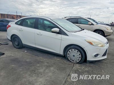 Czwarte zdjęcie samochodu z boku: 2013 FORD FOCUS SE VIN:1FADP3F20DL363092 - miniatura