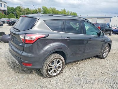 Trzecie zdjęcie samochodu z tyłu: 2018 FORD ESCAPE SE VIN:1FMCU9GD4JUD12259 - miniatura