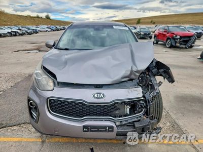 Piąte zdjęcie samochodu w środku: 2017 KIA SPORTAGE LX VIN:KNDPMCAC6H7276070 - miniatura