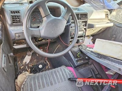 Zdjęcie 8 z 13 samochodu: 1993 GEO TRACKER VIN:2CNBJ18UXP6935073 - miniatura