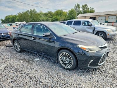 Czwarte zdjęcie samochodu z boku: 2016 TOYOTA AVALON LIMITED VIN:4T1BK1EB4GU238936 - miniatura