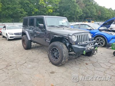 Czwarte zdjęcie samochodu z boku: 2017 JEEP WRANGLER UNLIMITED SAHARA VIN:1C4BJWEG2HL507667 - miniatura