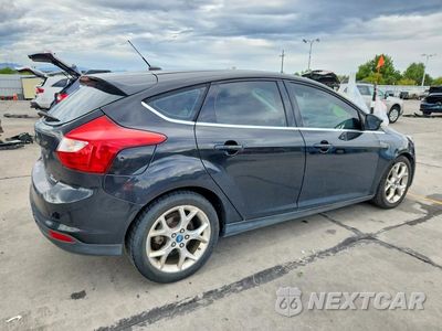 Trzecie zdjęcie samochodu z tyłu: 2012 FORD FOCUS SEL VIN:1FAHP3M2XCL400295 - miniatura