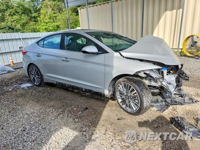 Czwarte zdjęcie samochodu z boku: 2018 HYUNDAI ELANTRA SPORT VIN:KMHD04LB4JU472584 - miniatura