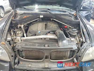 Zdjęcie 12 z 13 samochodu: 2012 BMW X5 XDRIVE35I VIN:5UXZV4C54CL750638 - miniatura