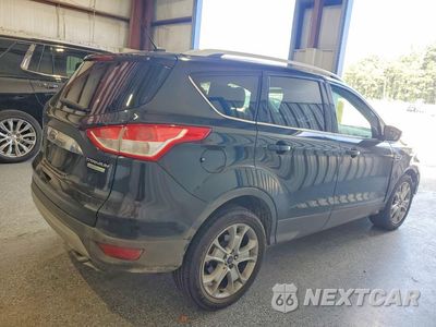 Trzecie zdjęcie samochodu z tyłu: 2015 FORD ESCAPE TITANIUM VIN:1FMCU0J90FUA68679 - miniatura