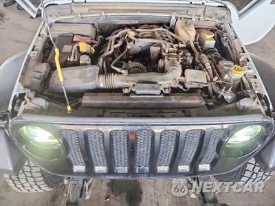 Zdjęcie 12 z 14 samochodu: 2022 JEEP WRANGLER UNLIMITED SPORT VIN:1C4HJXDG7NW223592 - miniatura