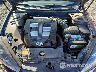 Zdjęcie 11 z 12 samochodu: 2007 HYUNDAI TIBURON GT VIN:KMHHN66F77U250465 - miniatura